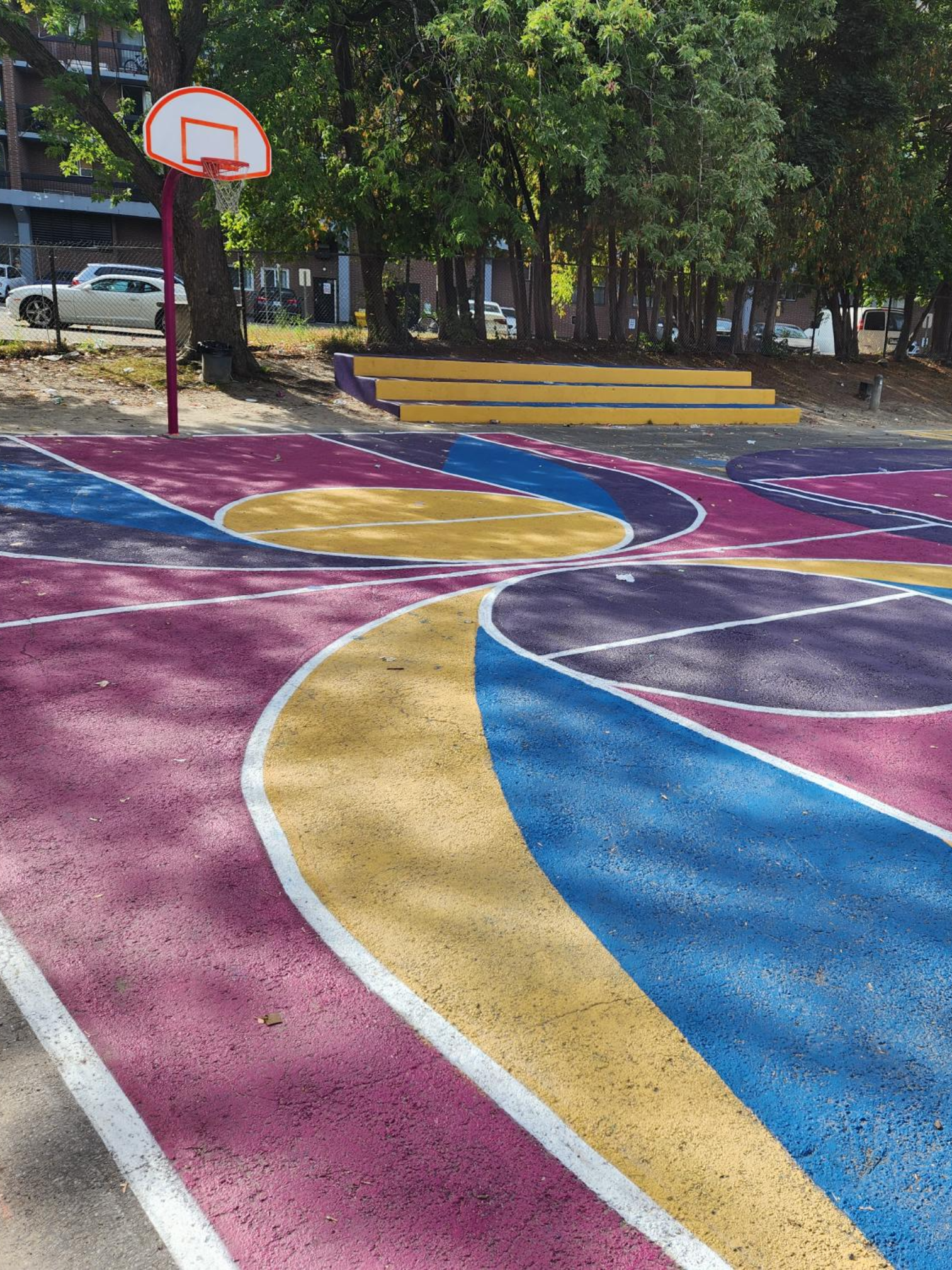 Basketball court painted by volunteers